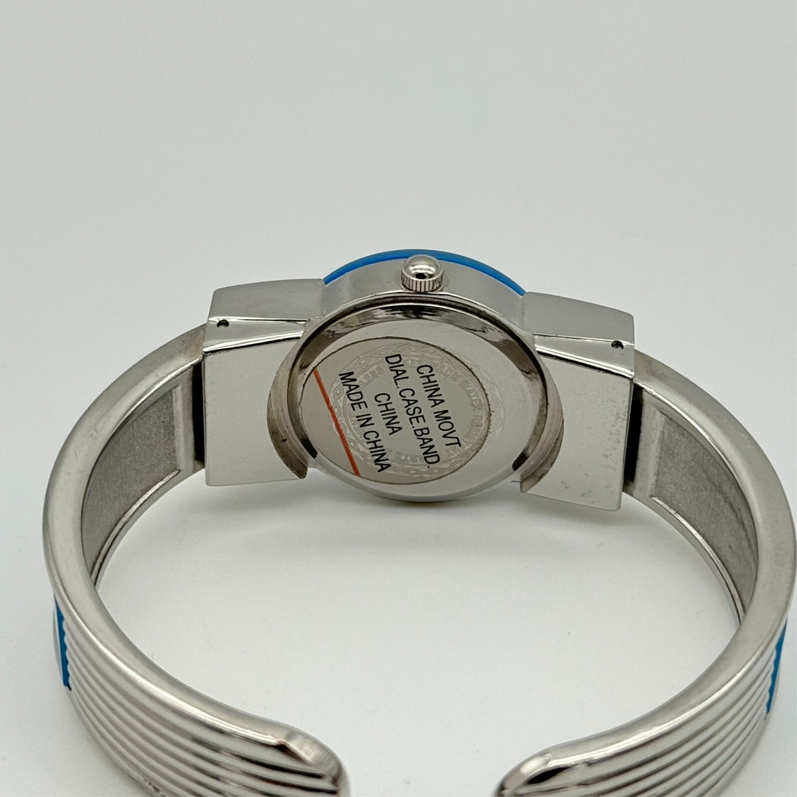 Women’s VELACCIO Glossy Silver Tone, Blue Apple Bangle Bracelet Watch, 24mm Runs