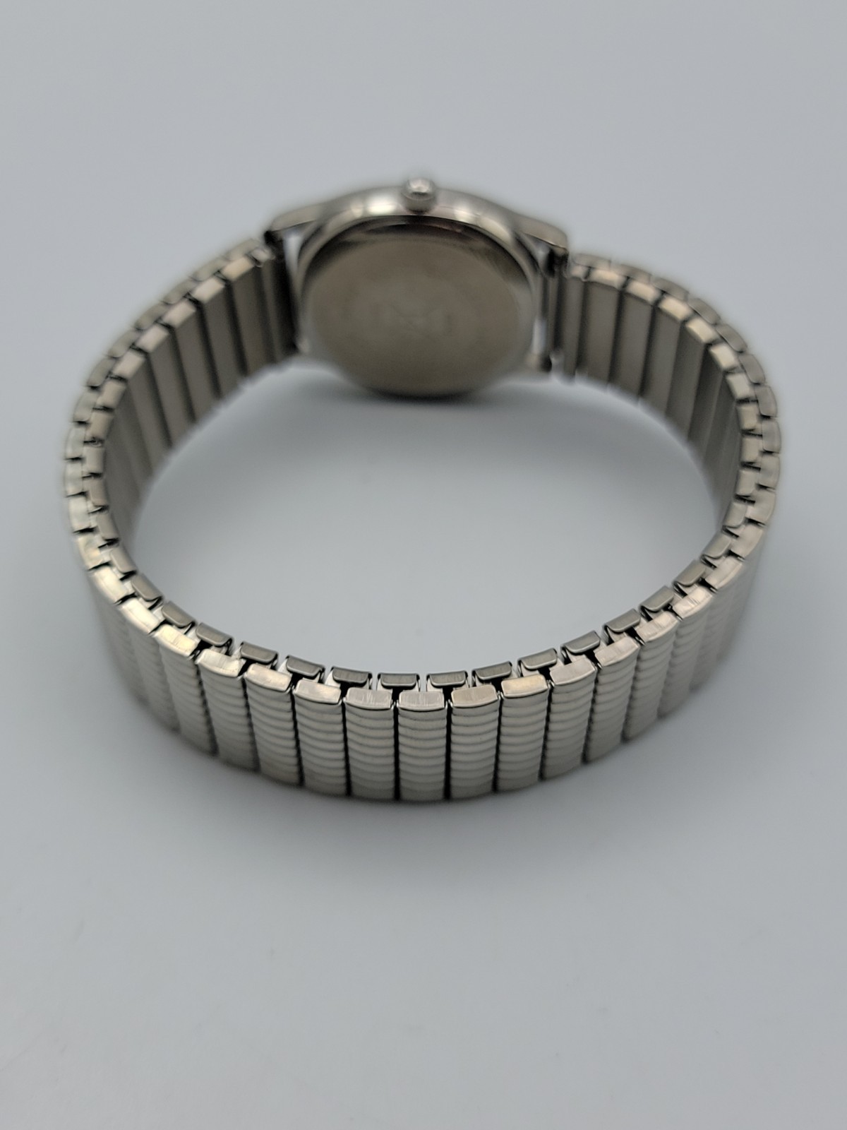 Women Quartz Watch 26mm Cushion Dial Silver Tone Stretch Band 6.5″, Runs