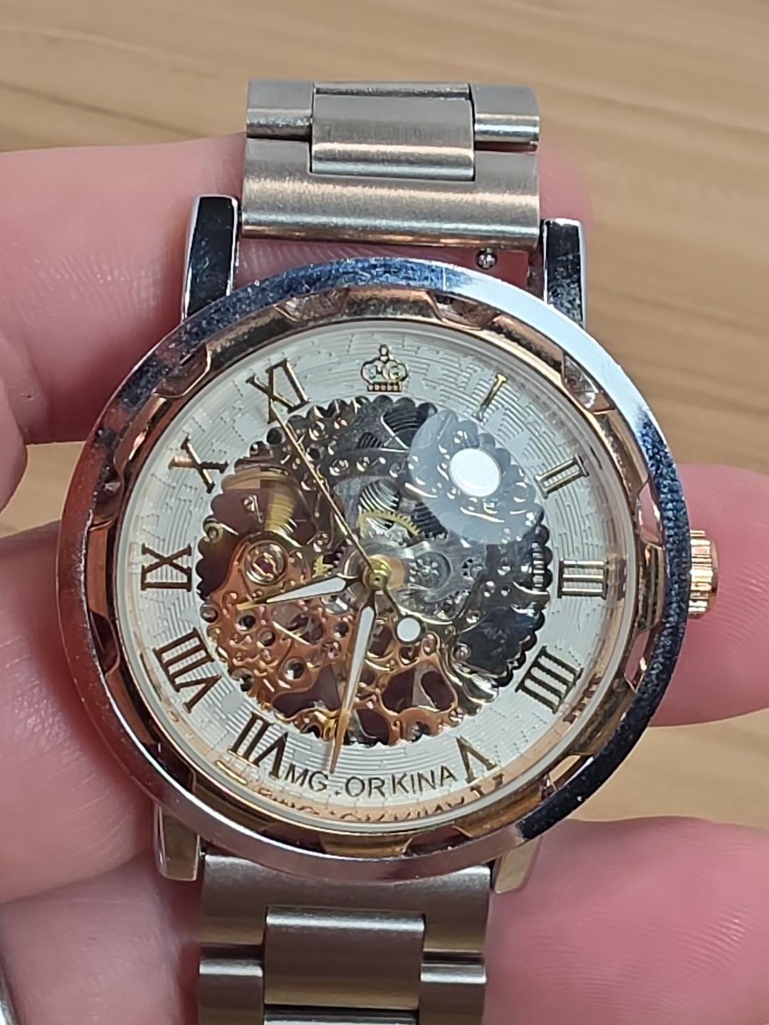 MG ORKINA AUTOMATIC SKELATON GOLD COLORED FACE WATCH WITH Silver BAND
