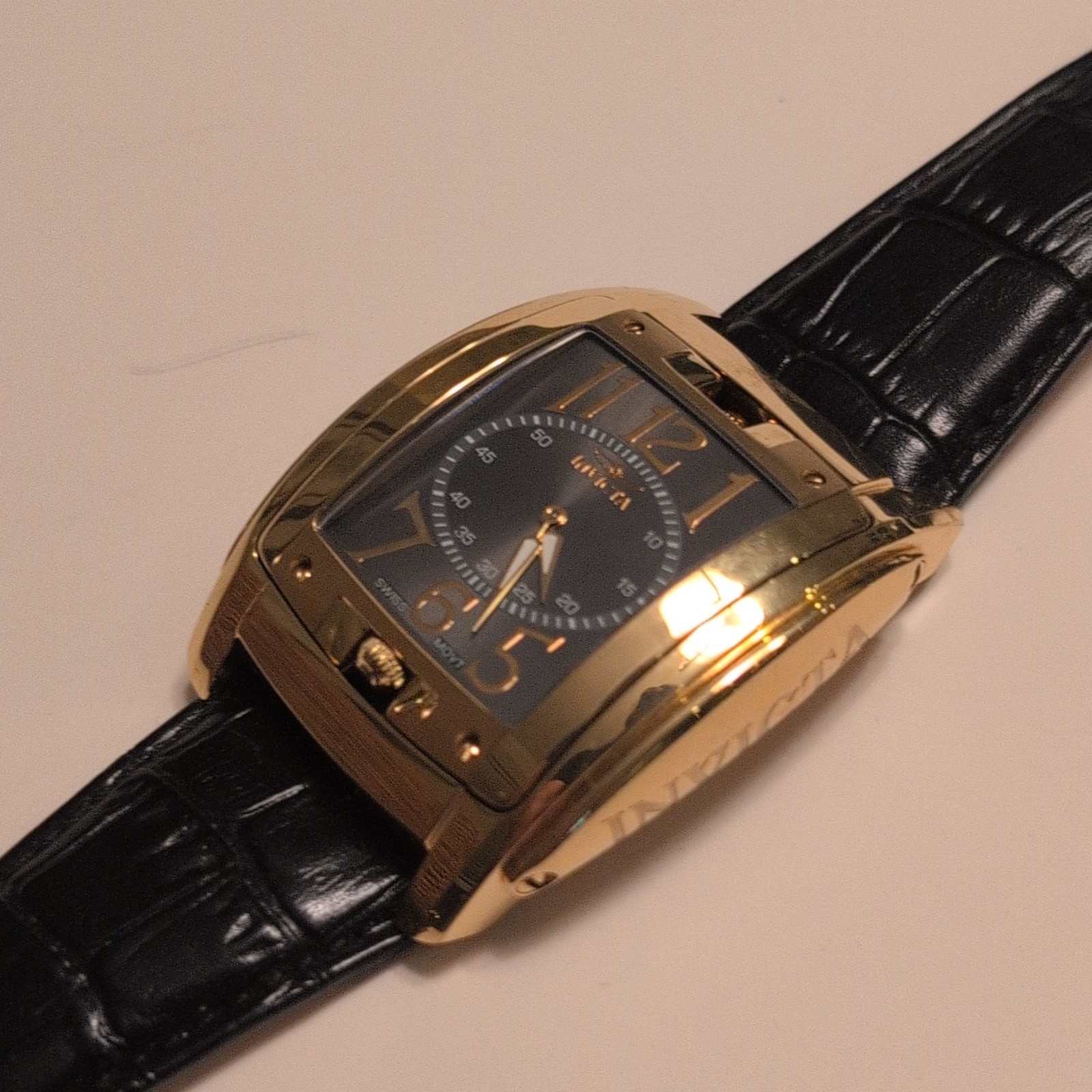 Invicta 22390 Quartz Rectangle Gold Tone Case Black Dial Leather Strap 50m