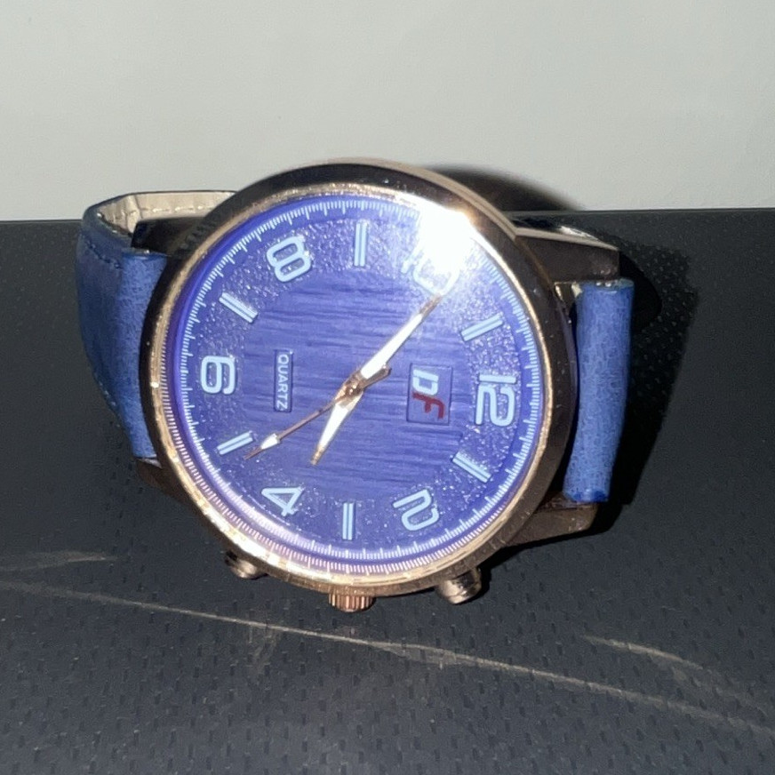 Men’s Analog Watch Blue Textured Dial Gold Tone Case Blue Faux Leather Strap