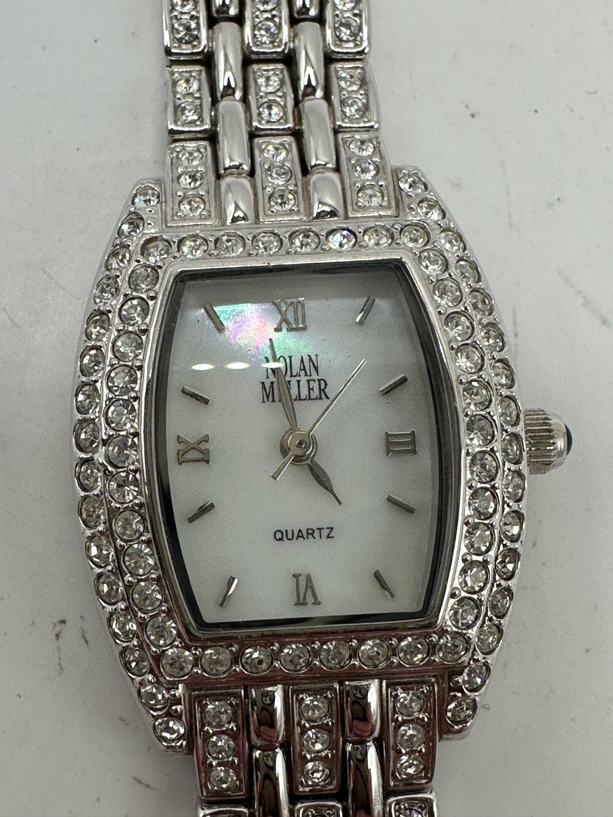 Nolan Miller Glamour Collection Ladies Watch SilverTone MOP Rhinestone Running