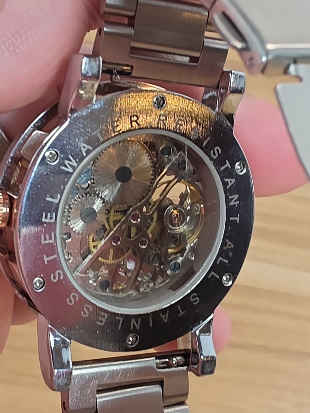 MG ORKINA AUTOMATIC SKELATON GOLD COLORED FACE WATCH WITH Silver BAND
