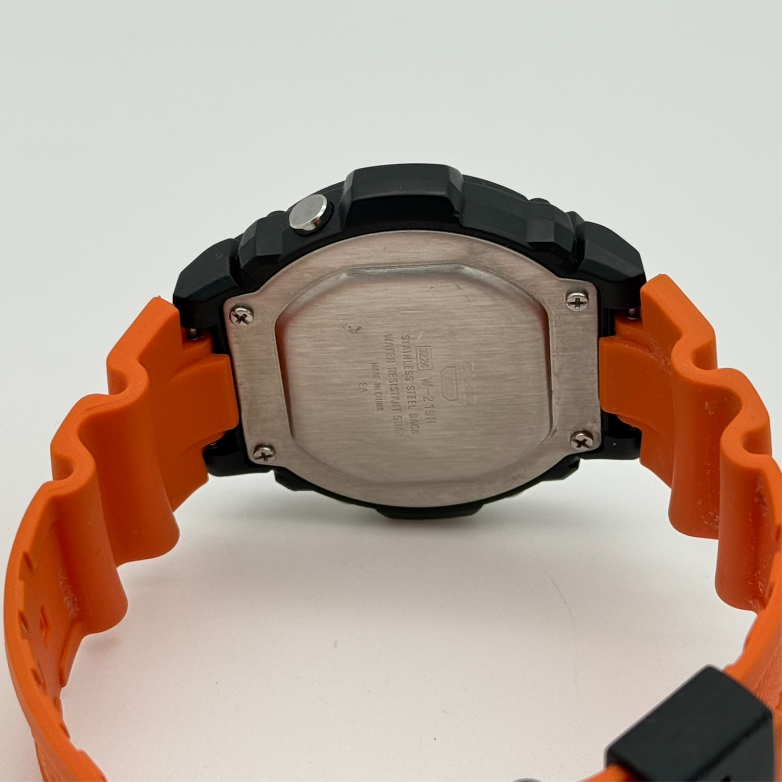 Men’s CASIO Digital Alarm Chronograph Watch, Black Case, Orange Band, W-219H-4AV