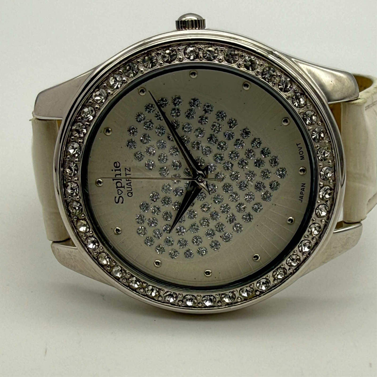 Women’s SOPHIE Silver Tone Crystal Heart Dial Watch, White Band, 45mm, Runs