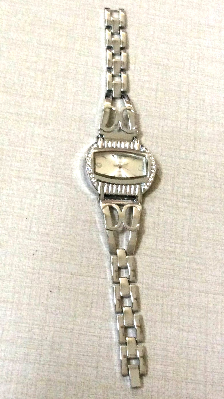 Finesse Women’s Watch Rectangle Crystal Bezel Silver Dial on a Silver Link Band!