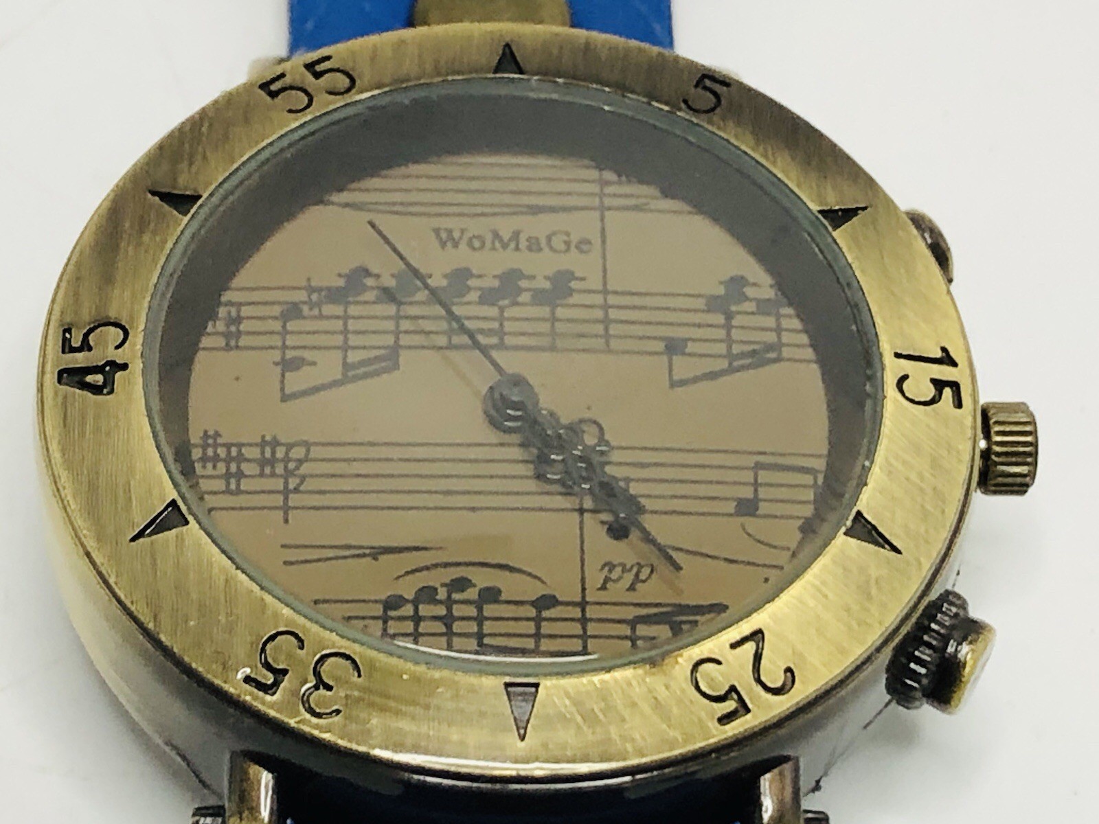 Music notes wristwatch with blue band battery not included