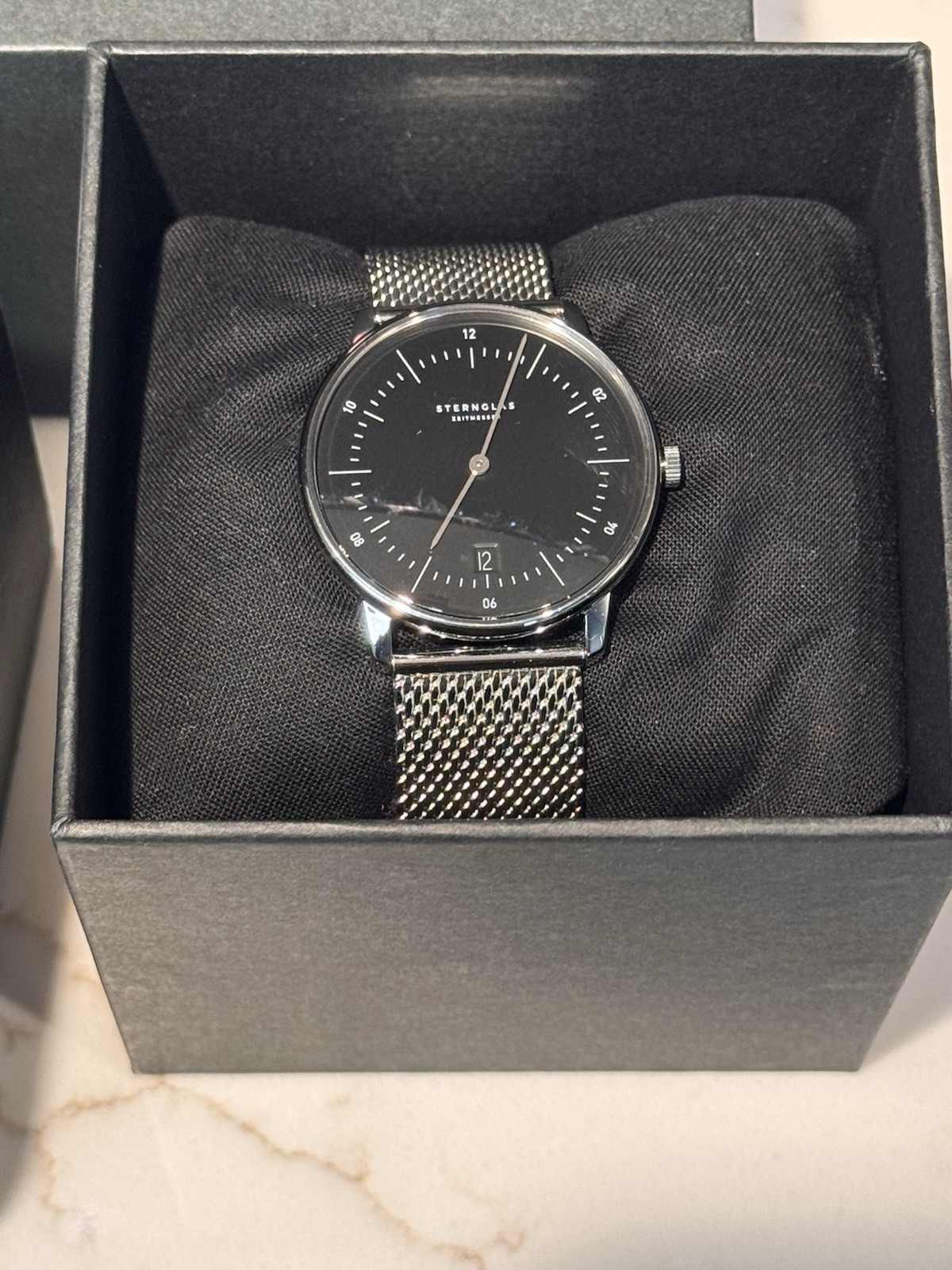 STERNGLAS Naos Quartz 38mm Black Dial Bauhaus Steel Milanaise Strap