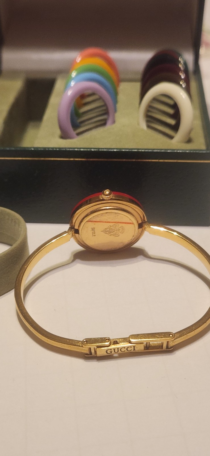 Gucci 1100 Series Interchangeable Bezel Watch (referred to as the Gucci 11/12)