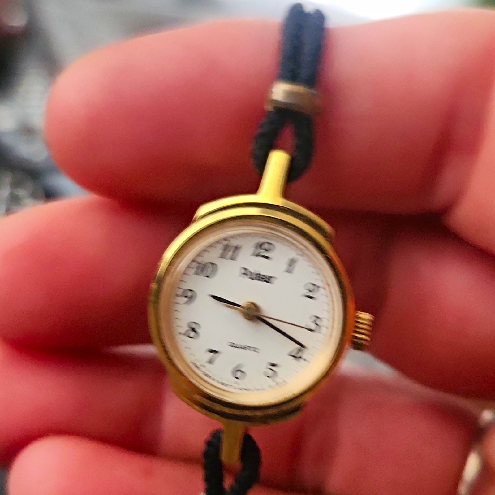 Pulsar Women’s Vintage Quartz Analog Gold Tone White Dial Black Cord Strap