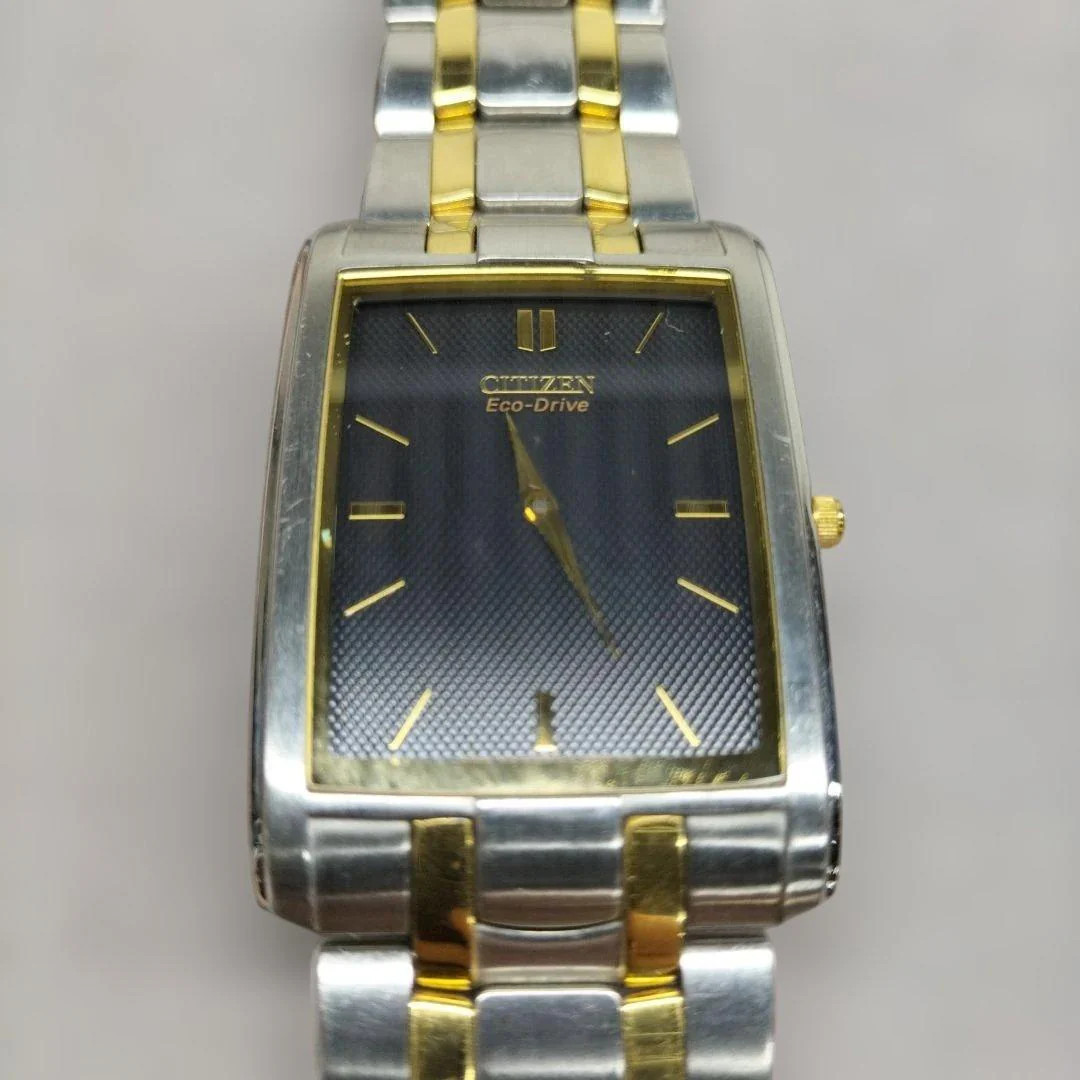CITIZEN Mens Eco-Drive Solar Silver Gold Stainless Steel Band Black Dial Watch