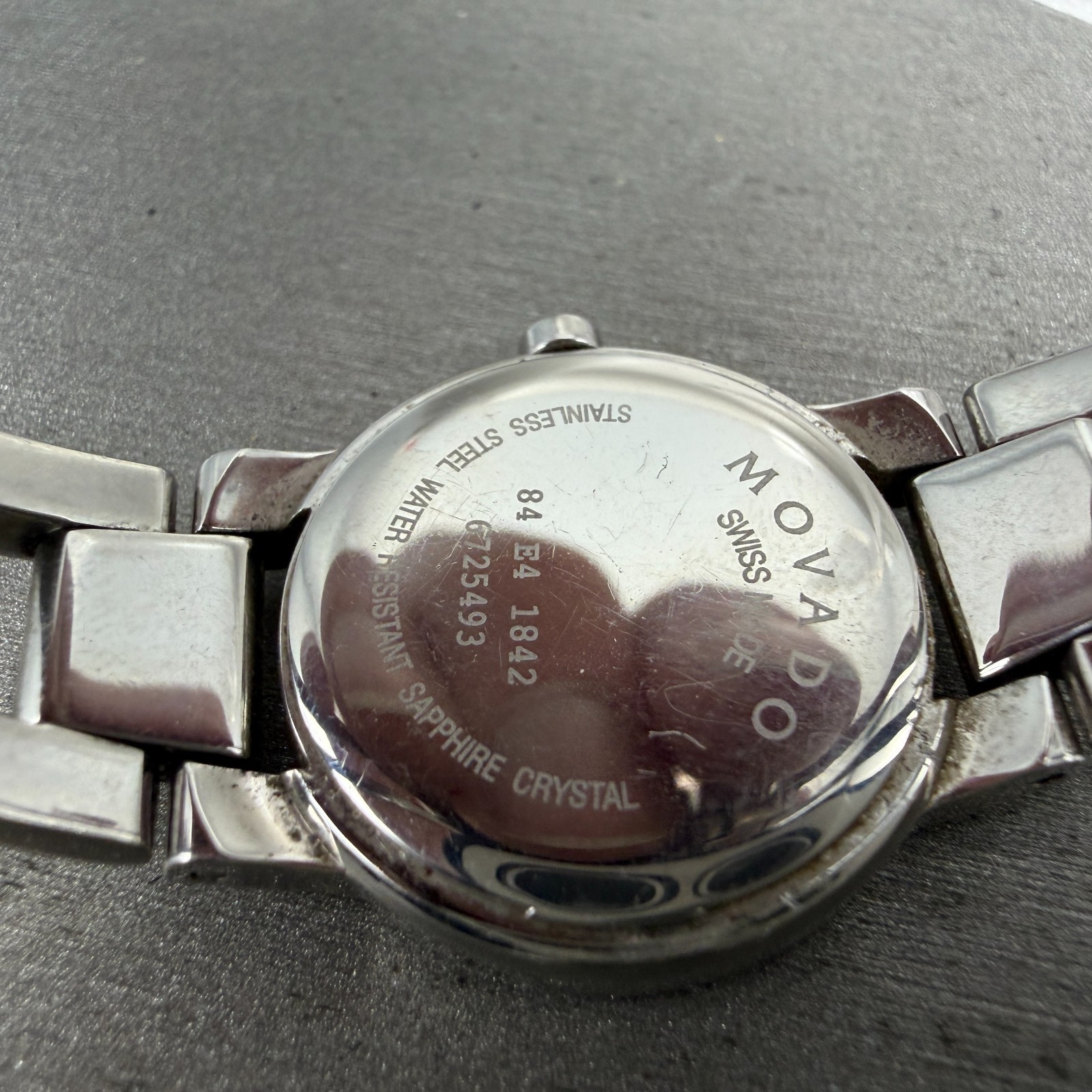 Movado Amorosa Watch Women 24m Black Dial Silver Tone Round 84 E4 1842 NewBat NB