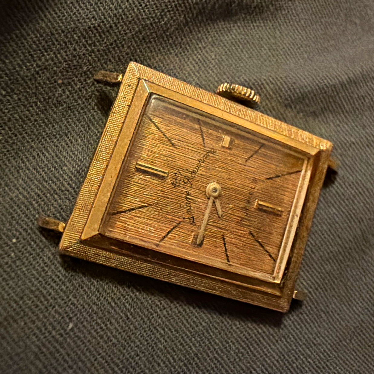 Huguenin Freres Manual Wind Mechanical Gold Tone Rectangular Textured Dial