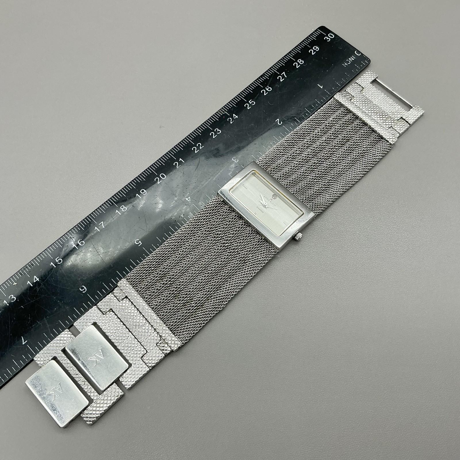 Anne Klein Womens Watch Silver Dial Mesh Bracelet Rectangle Diamond Quartz