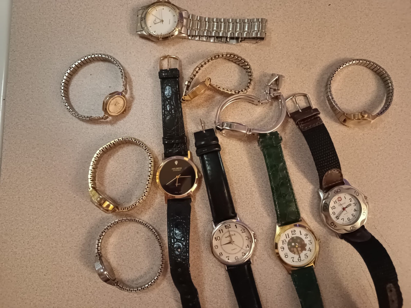 Collection of men’s and women’s used watches – various brands and sizes