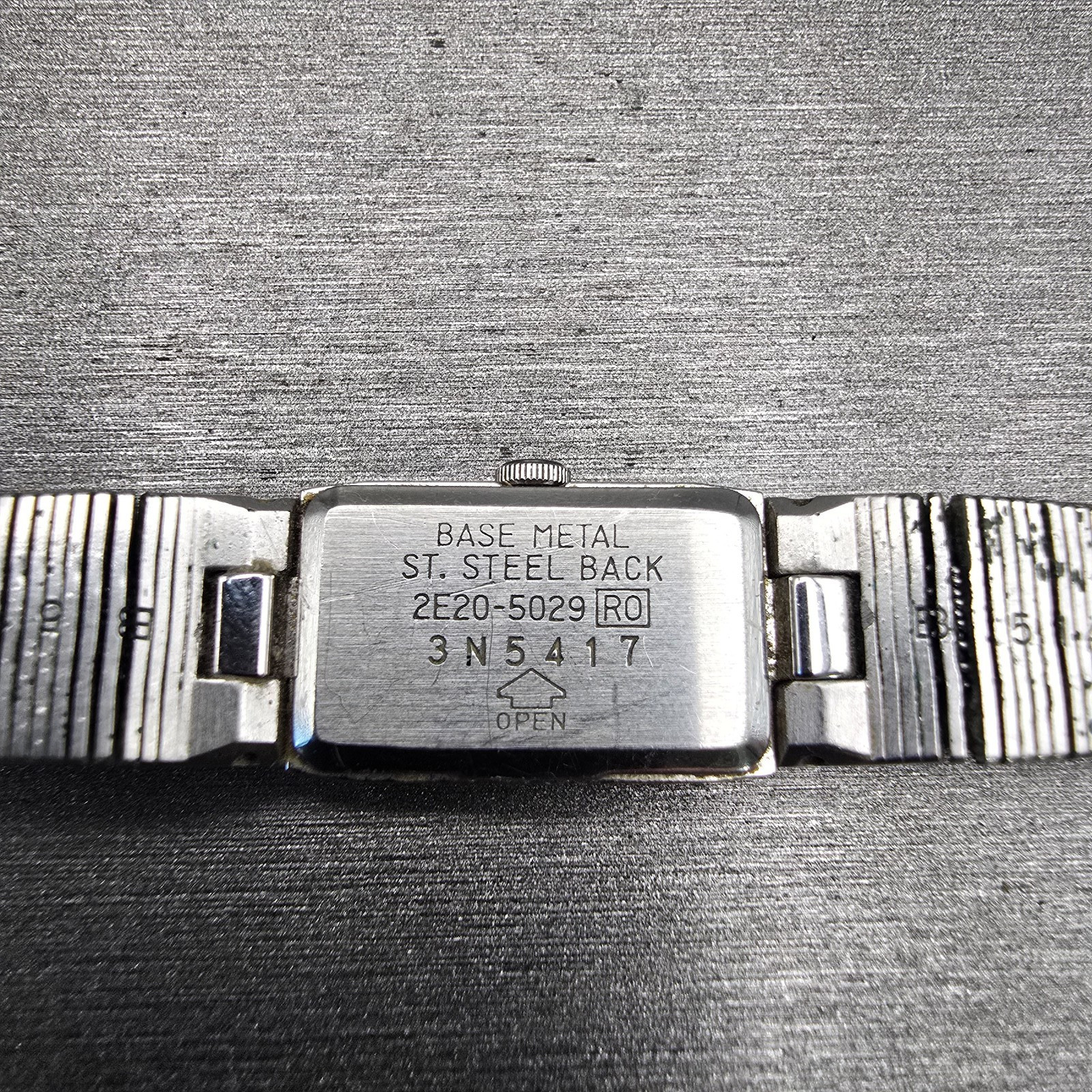 Seiko Watch Women 12mm Silver Dial Silver Tone Rectangle 2E20-5029 New Battery
