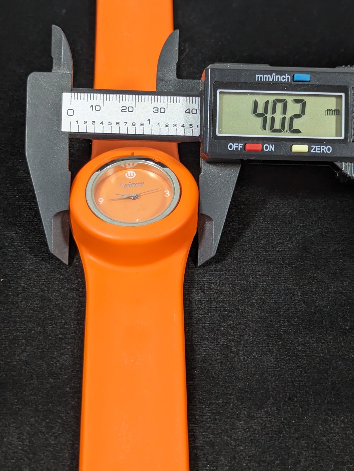 Winky Silver Tone Orange Dial Slap On Band Watch