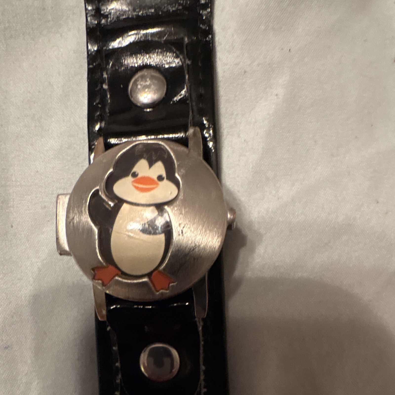 Penguin Analog Wristwatch Black Faux Leather Strap Silver Case White Dial Animal
