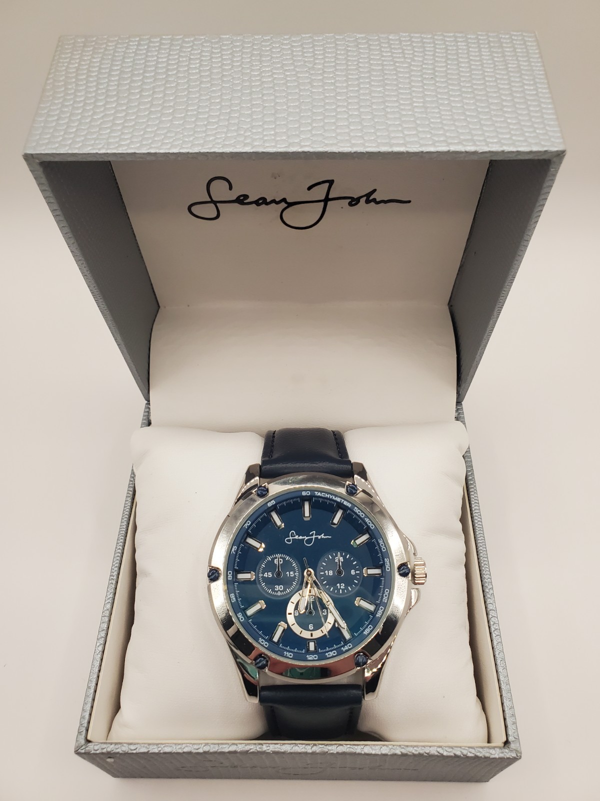 Sean John Men Black Leather Strap Blue Analog Dial Chronograph Quartz Watch