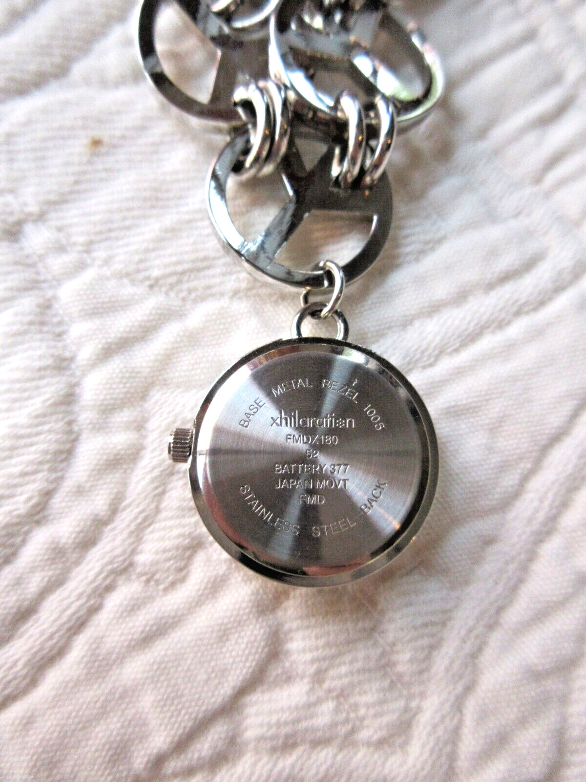 XHILARATION WRISTWATCH POLISHED CHROME PEACE SIGNS SECONDS HAND NEW BATTERY SS