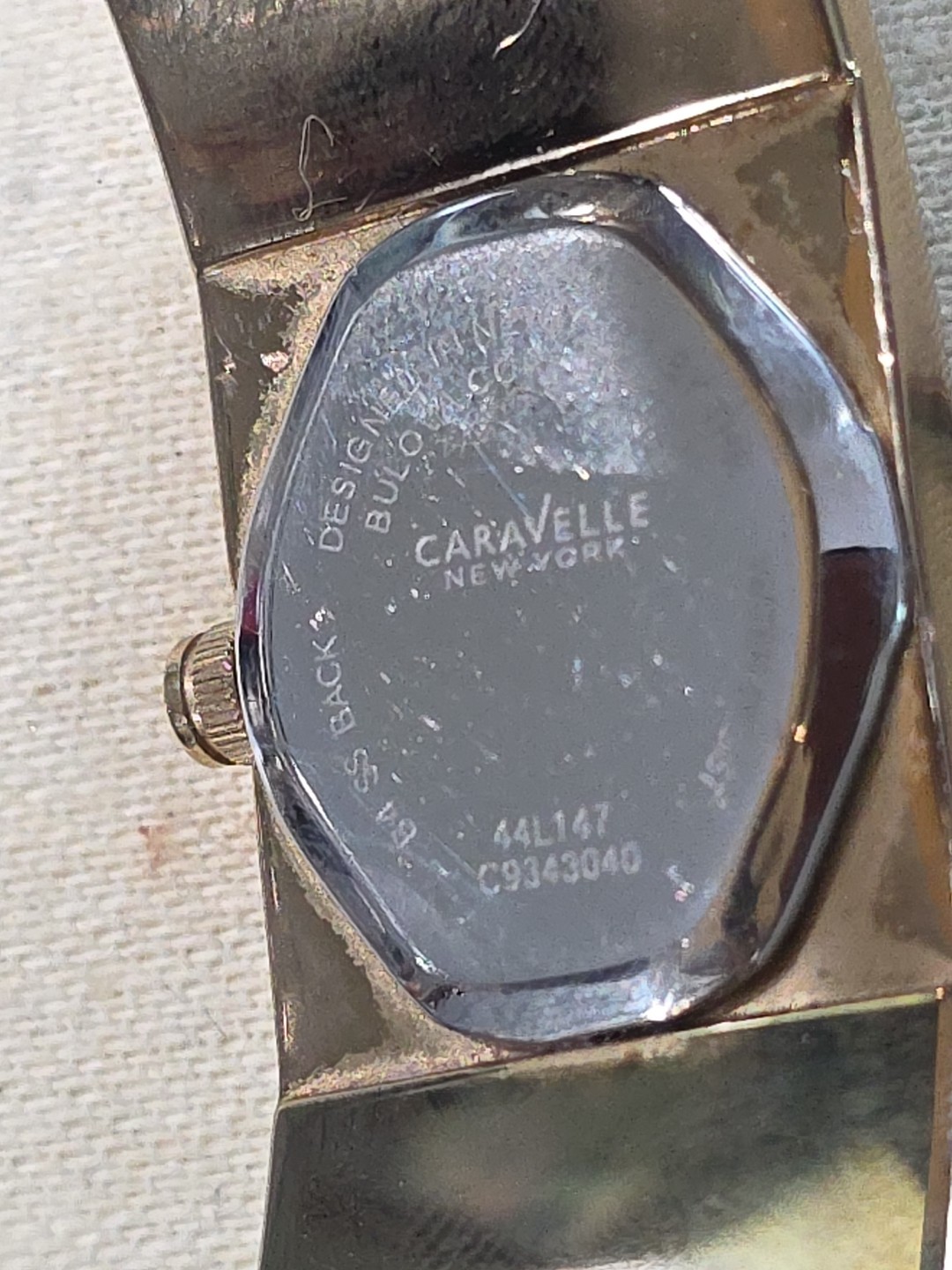 Caravelle New York 44L147 Women’s Gold Tone/Black Bangle Roman Analog Watch Runs