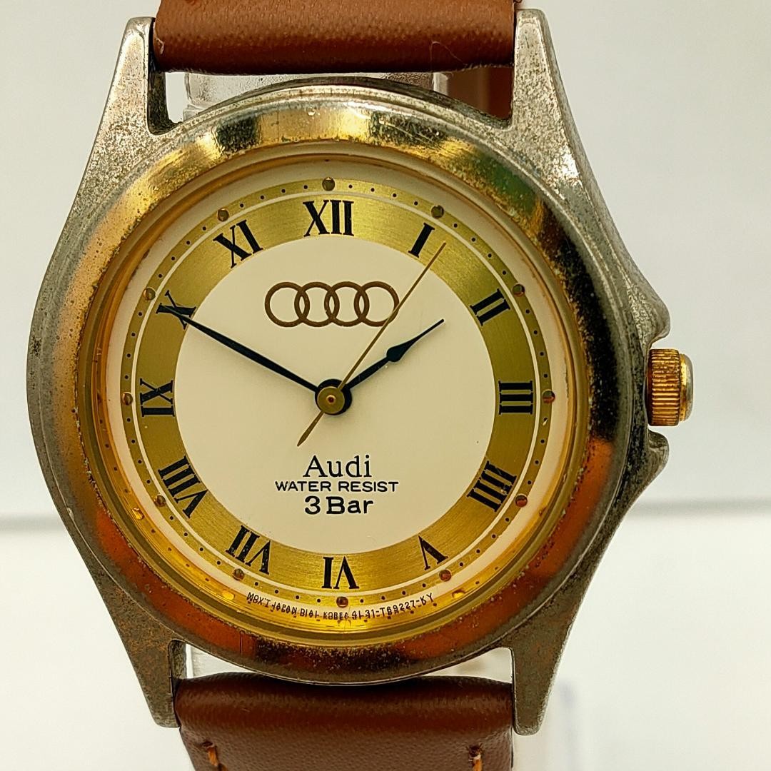 Audi Quattro Crater Gold-Tone Dial Roman Numeral Quartz Watch Dead battery