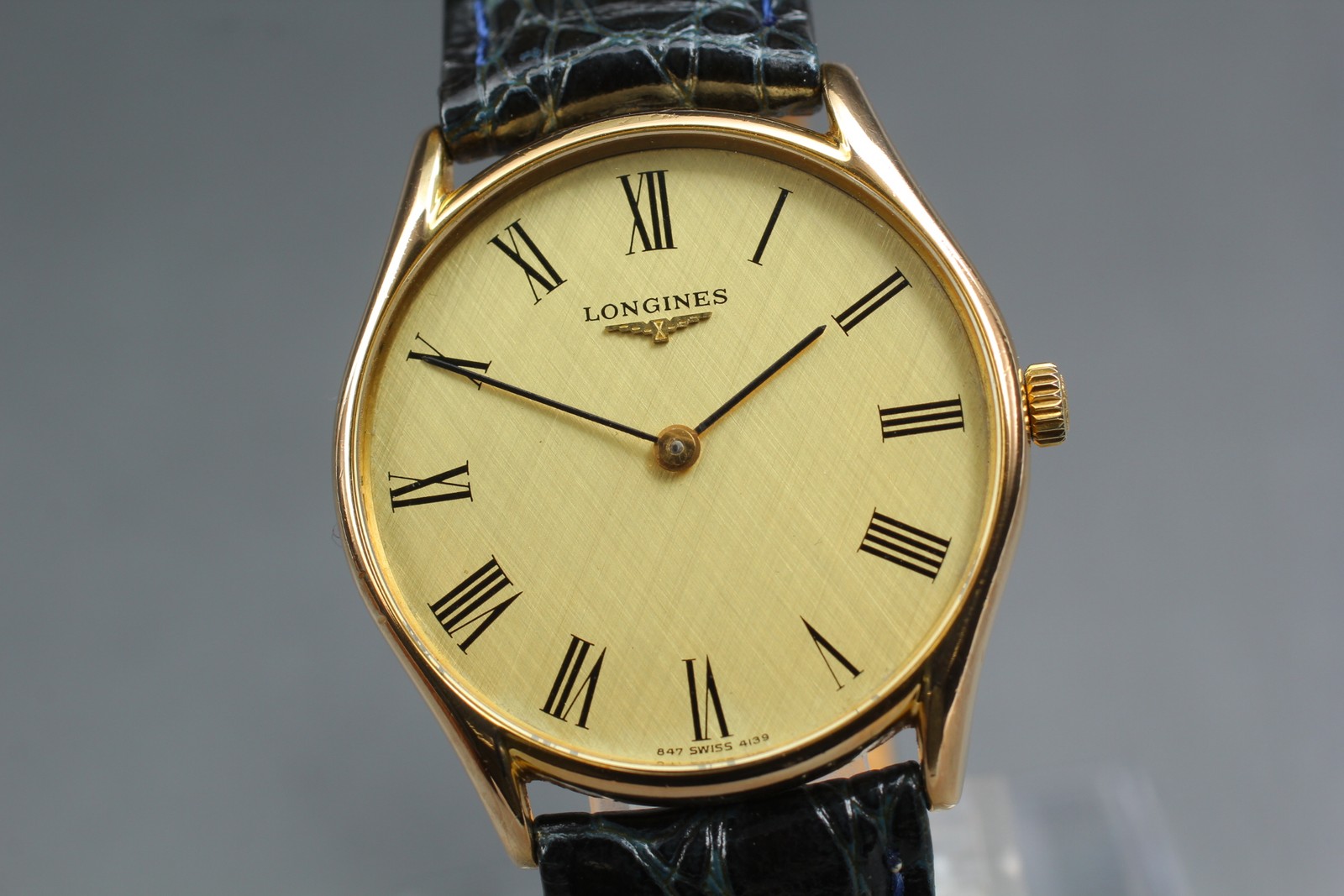 Near MINT Longines L847.4 Gold Roman Dial 33mm Hand Winding Men’s Watch w/ Box