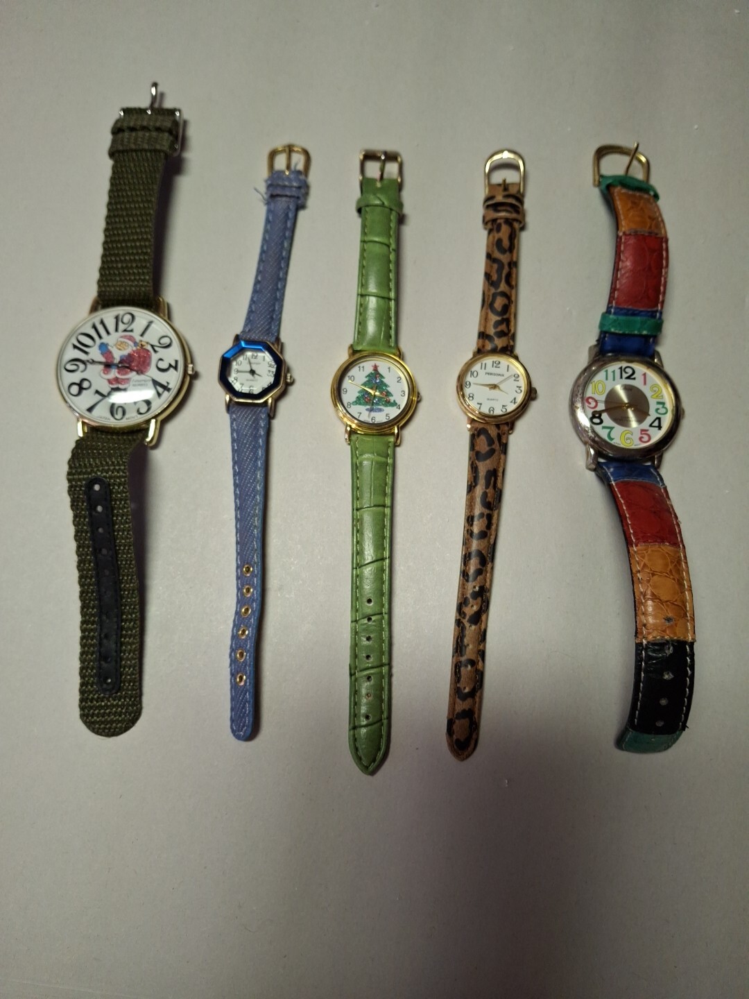 Wrist Watches A Variety Of Watch Faces In Different Sizes Two Are Christmas
