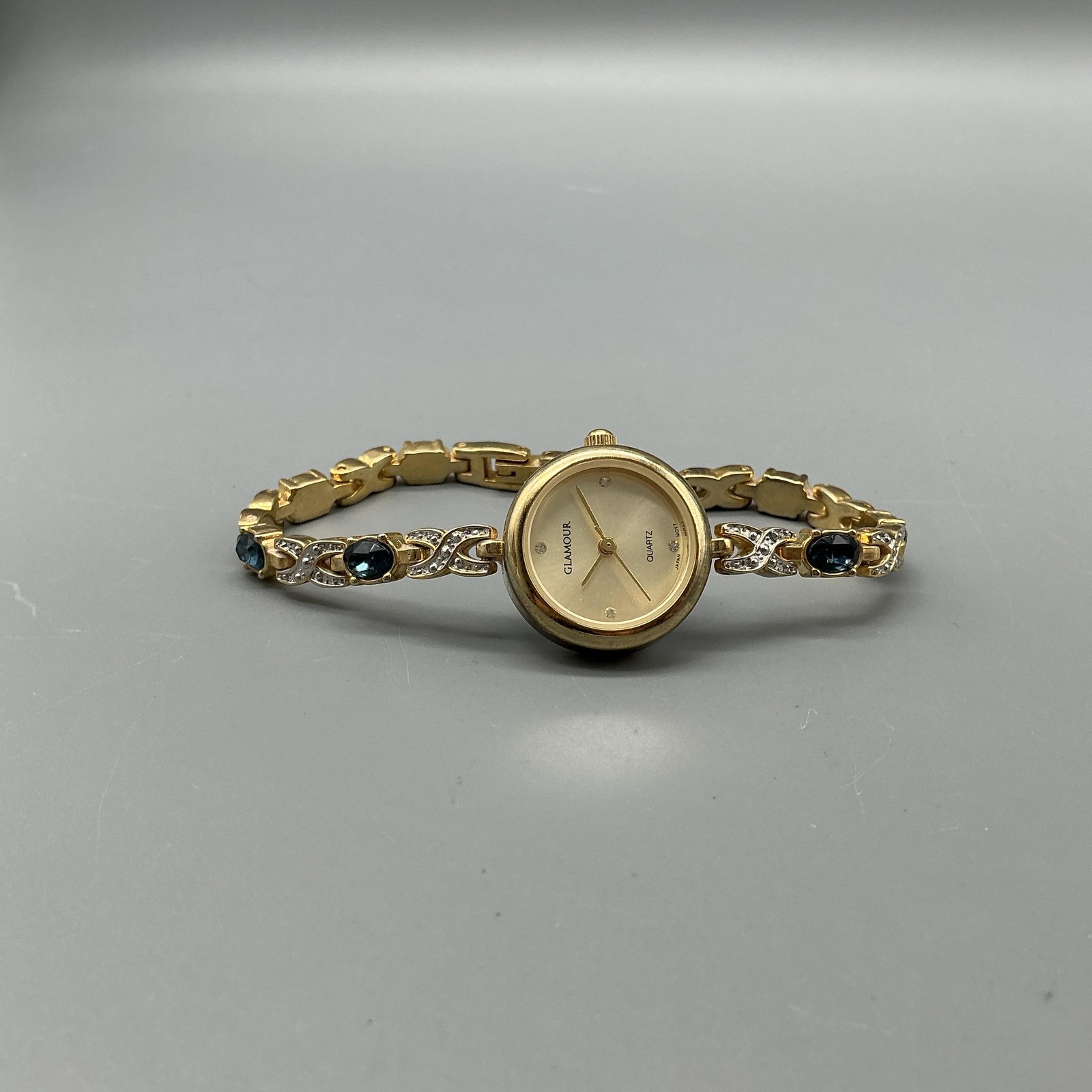Glamour Womens Watch 22mm Gold Tone Gem Bracelet Blue Stones New Battery 7.5″