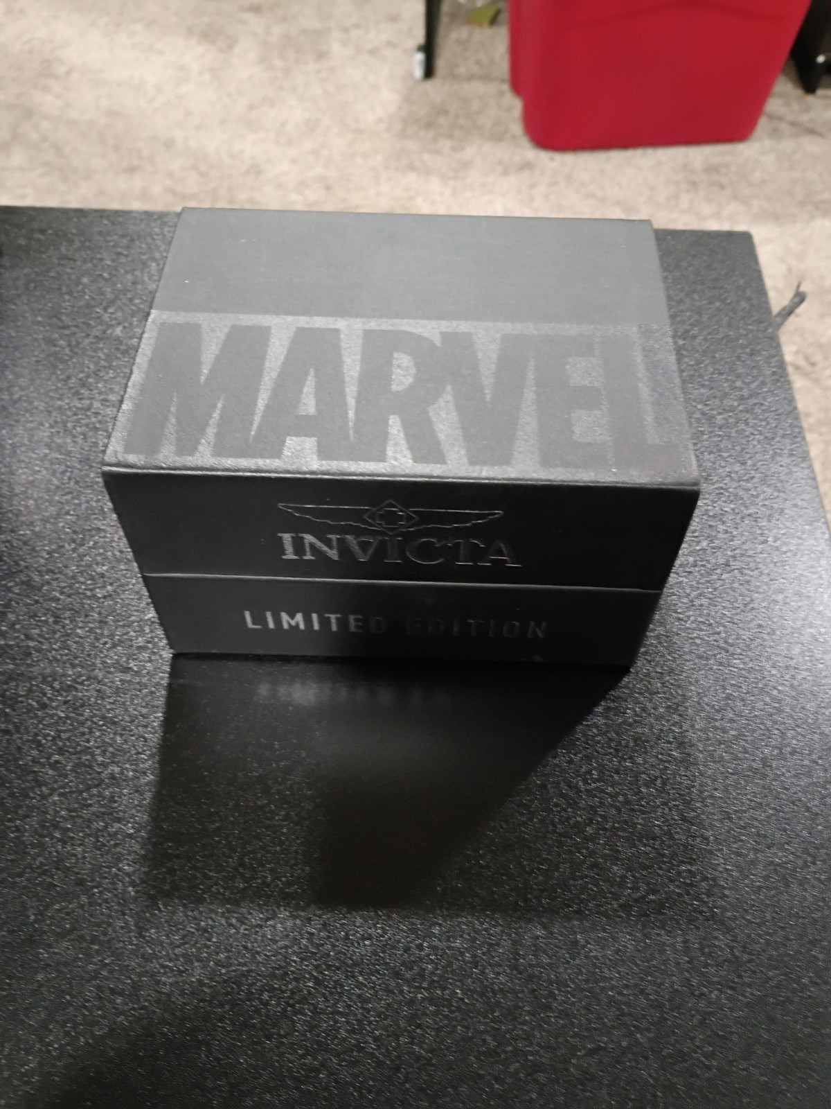 Invicta Marvel Men’s Quartz Chronograph Tachymeter Black/Gold Dial Red Strap Box