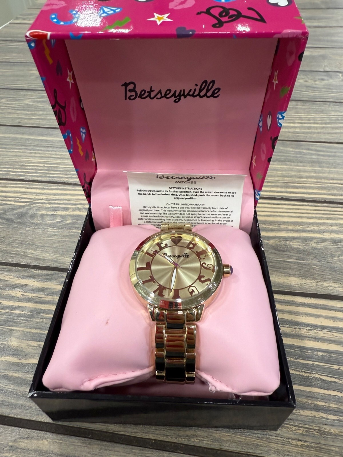 Betseyville Gold-Tone Round Dial Watch With Roman Numerals & Heart Detail