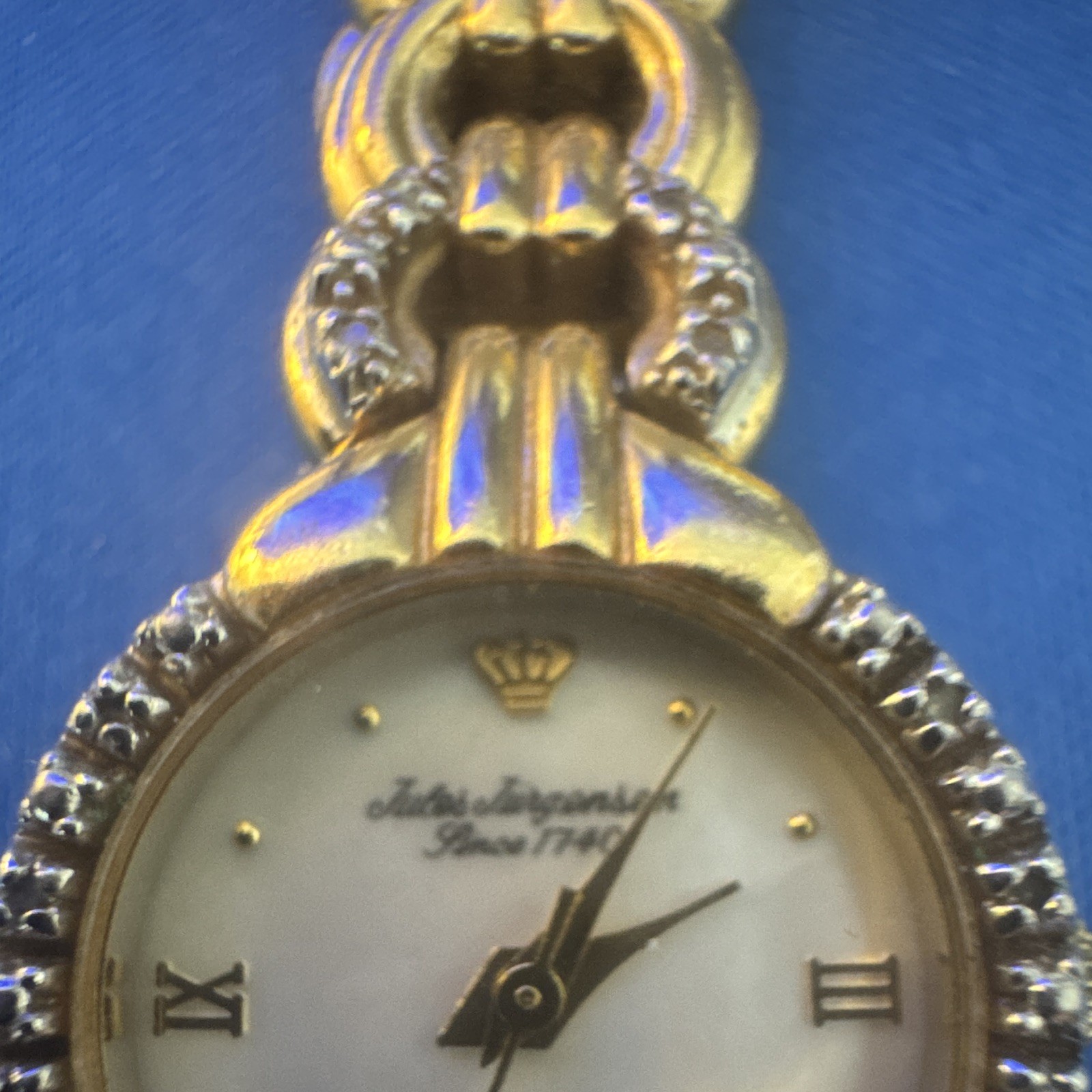 Jules Jurgensen Women’s Quartz Analog White Dial Roman Numerals Gold Bracelet