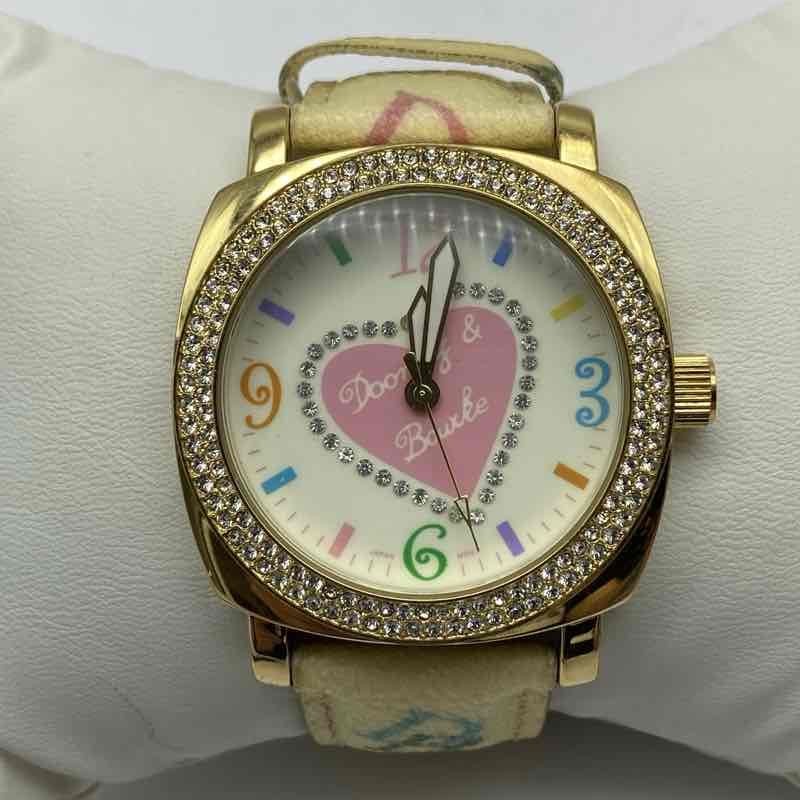 Dooney & Bourke Women’s Watch Gold Tone Crystal Bezel Heart Dial DB Logo Strap
