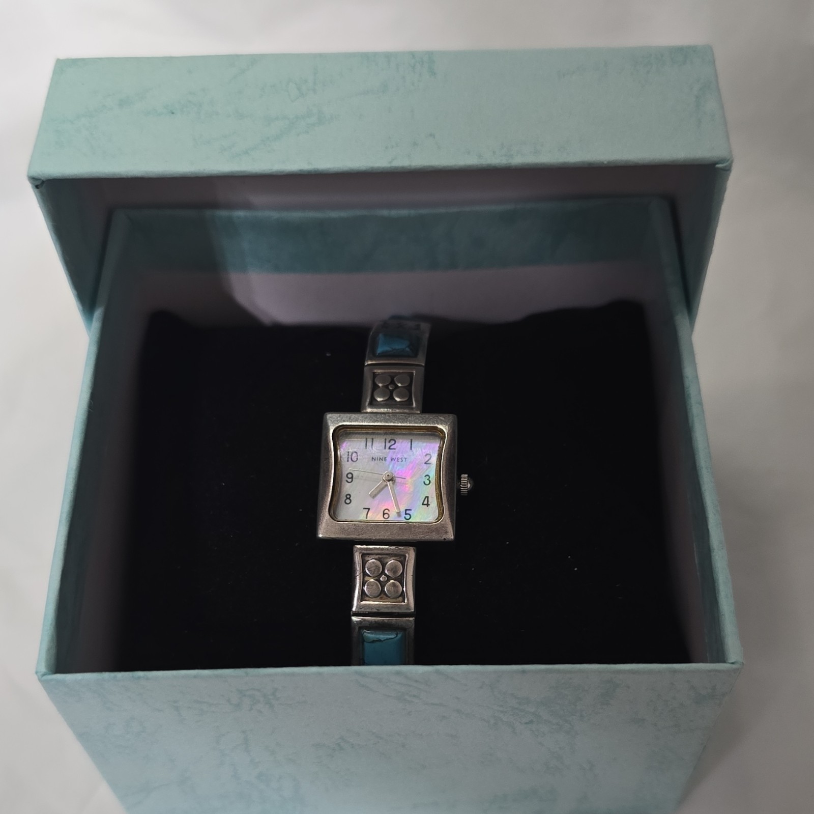 Nine West Women’s Quartz Square White Dial Silver Bracelet Blue Accents Box