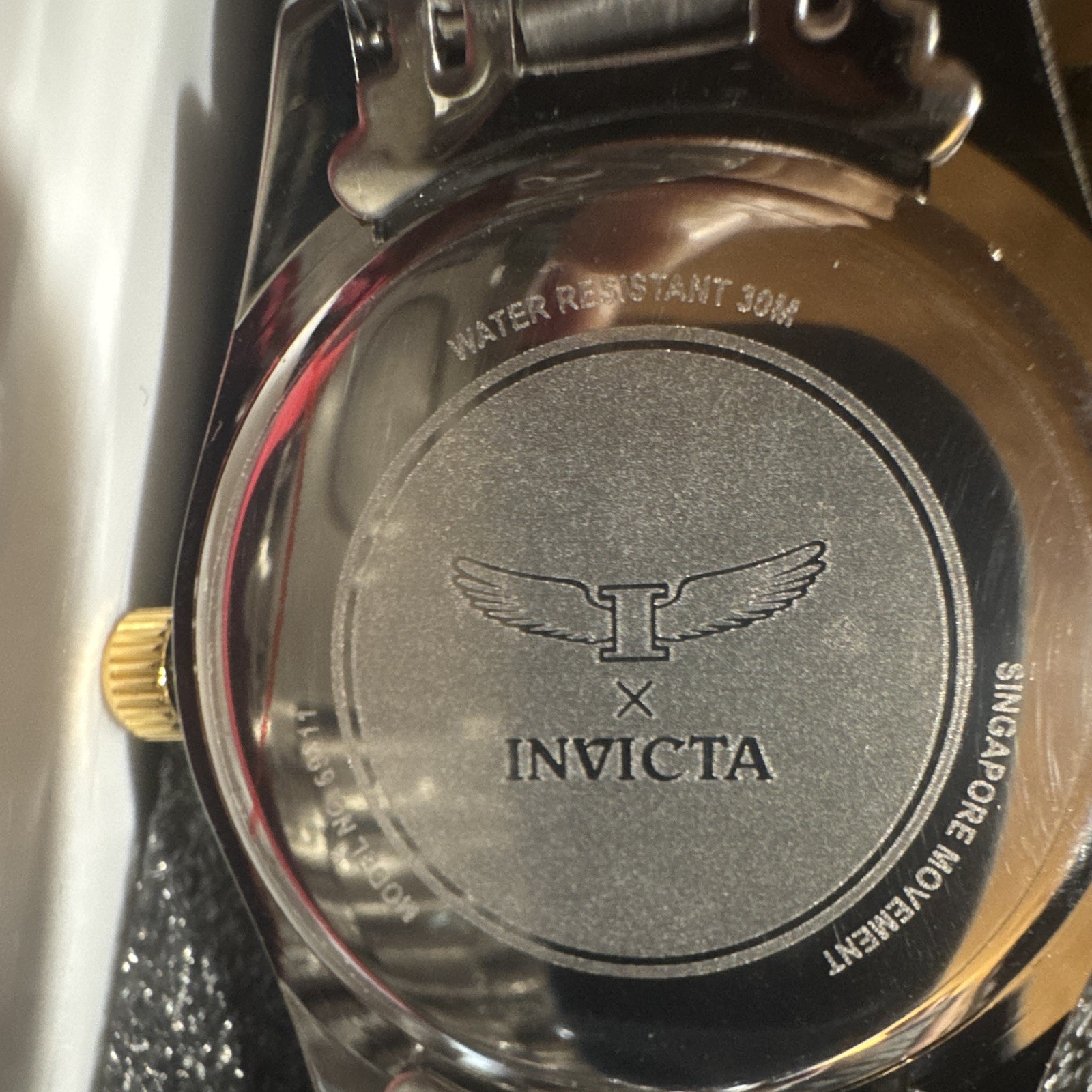 Invicta Men’s Quartz Two-Tone SS Bracelet Black Dial Fluted Bezel 30m