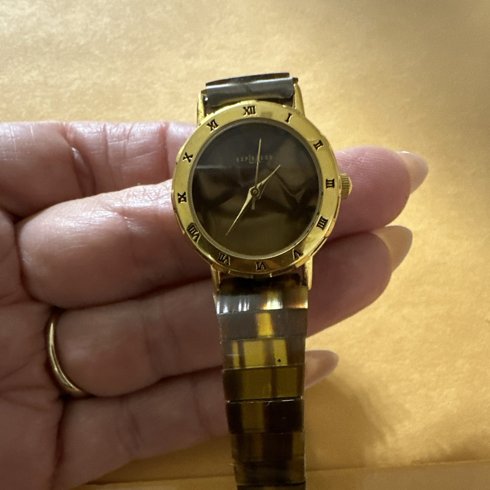 Express Women’s Quartz Analog Gold Tone Round Bracelet Black Roman Dial 12-Hr