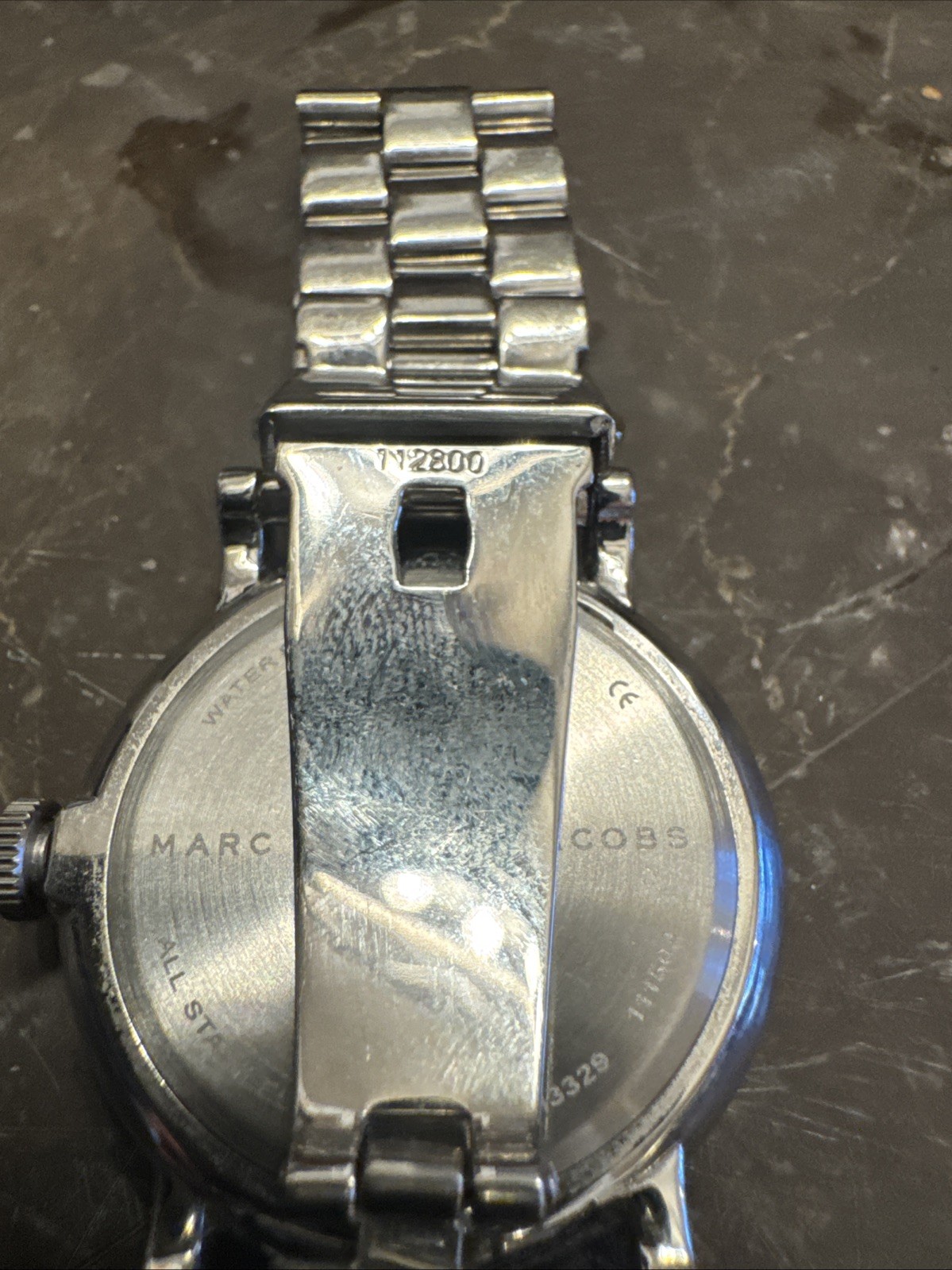 Marc Jacob’s Mbm3329 Women’s Stainless Steel Watch champagne color dial