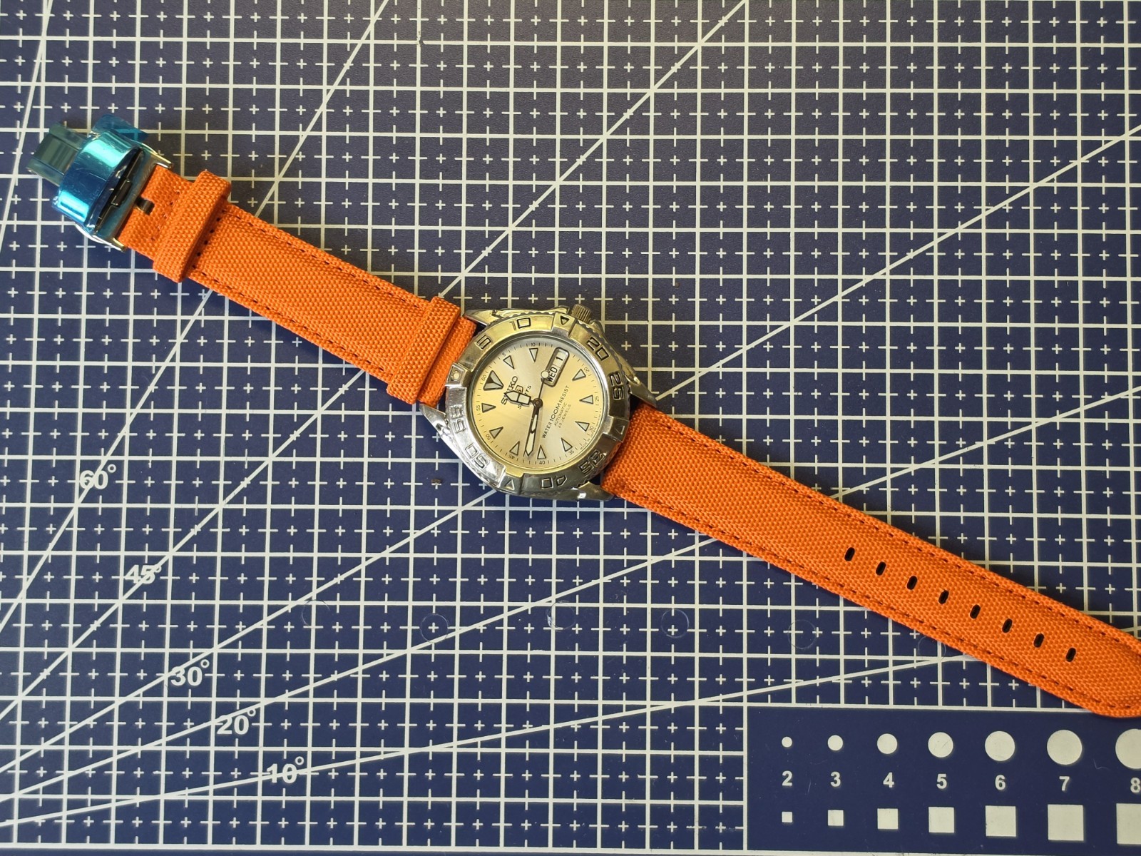 Seiko 5 Sports Automatic 100m Day/Date Silver Dial New Orange Band 7s36-00Y