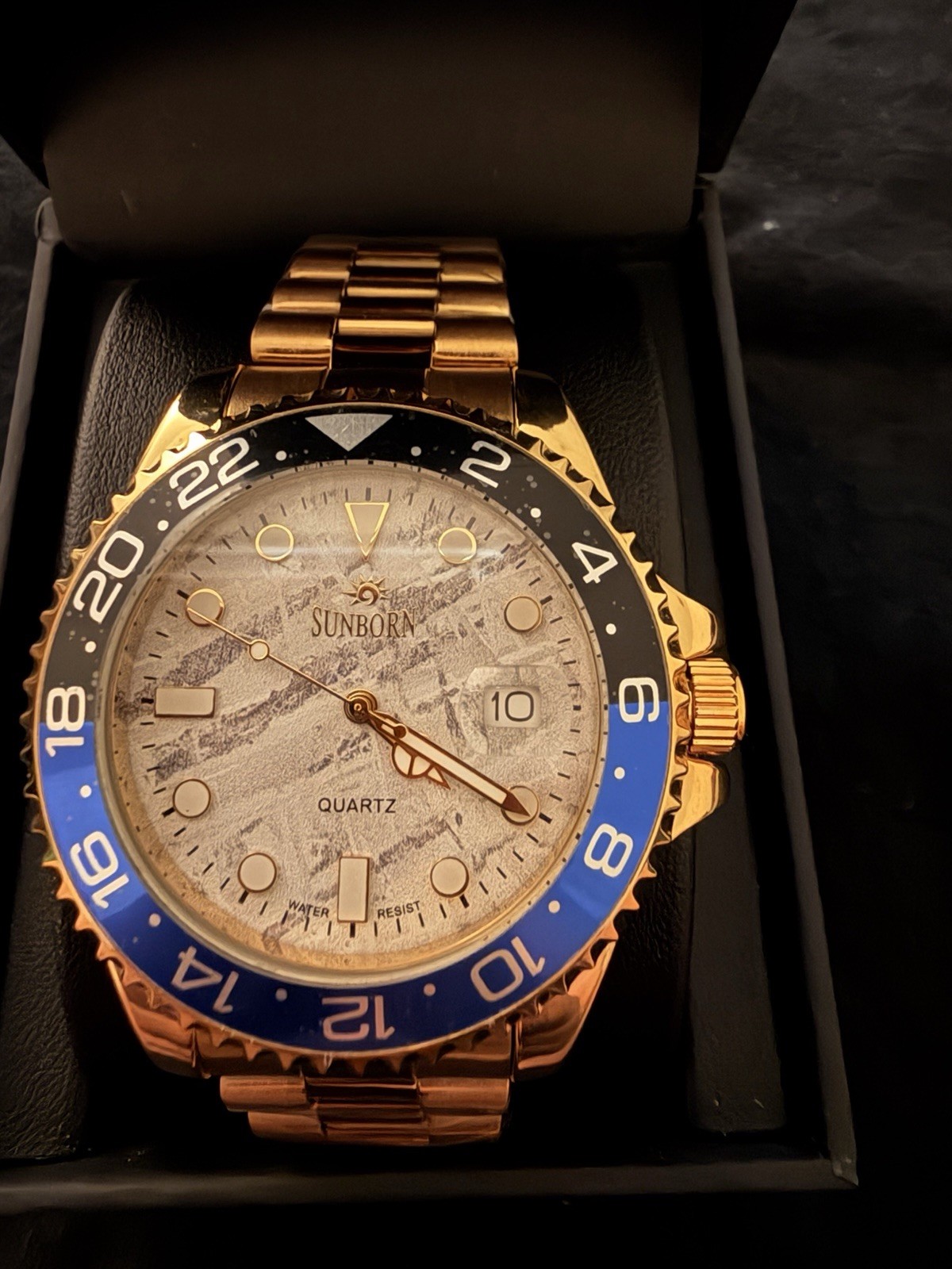 Sunborn Men’s Quartz Date Gold Tone Stainless Steel Bracelet Blue/Black Bezel