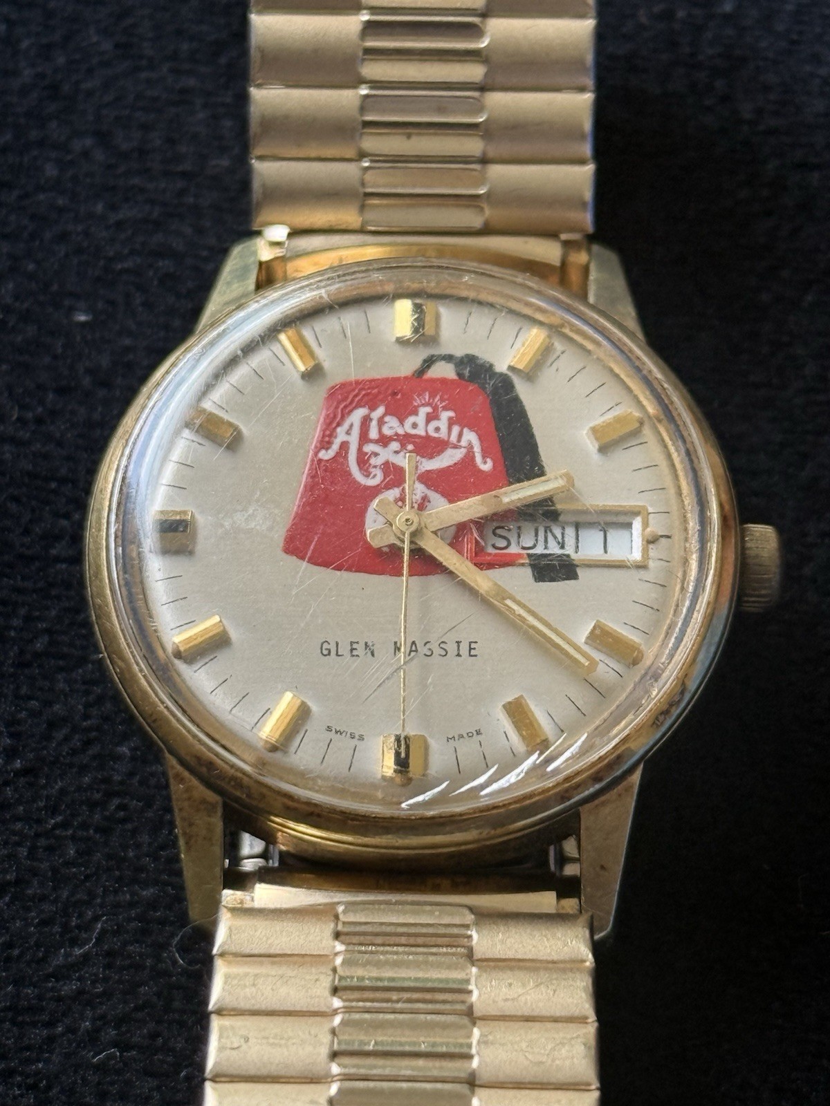 vintage gold-tone Swiss-made wristwatch with a custom/promotional dial