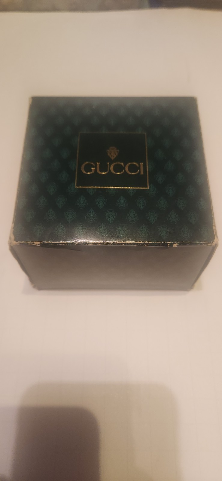 Gucci 1100 Series Interchangeable Bezel Watch (referred to as the Gucci 11/12)