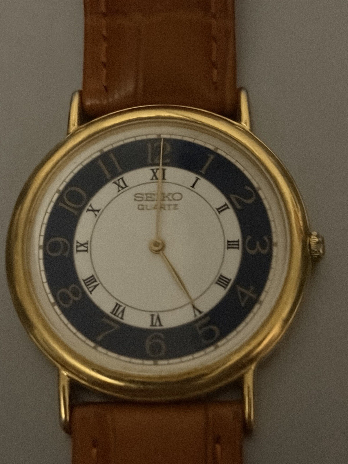 Men’s Seiko Classic Blue White Dial Gold Tone Case Navy Blue Leather Watch 04