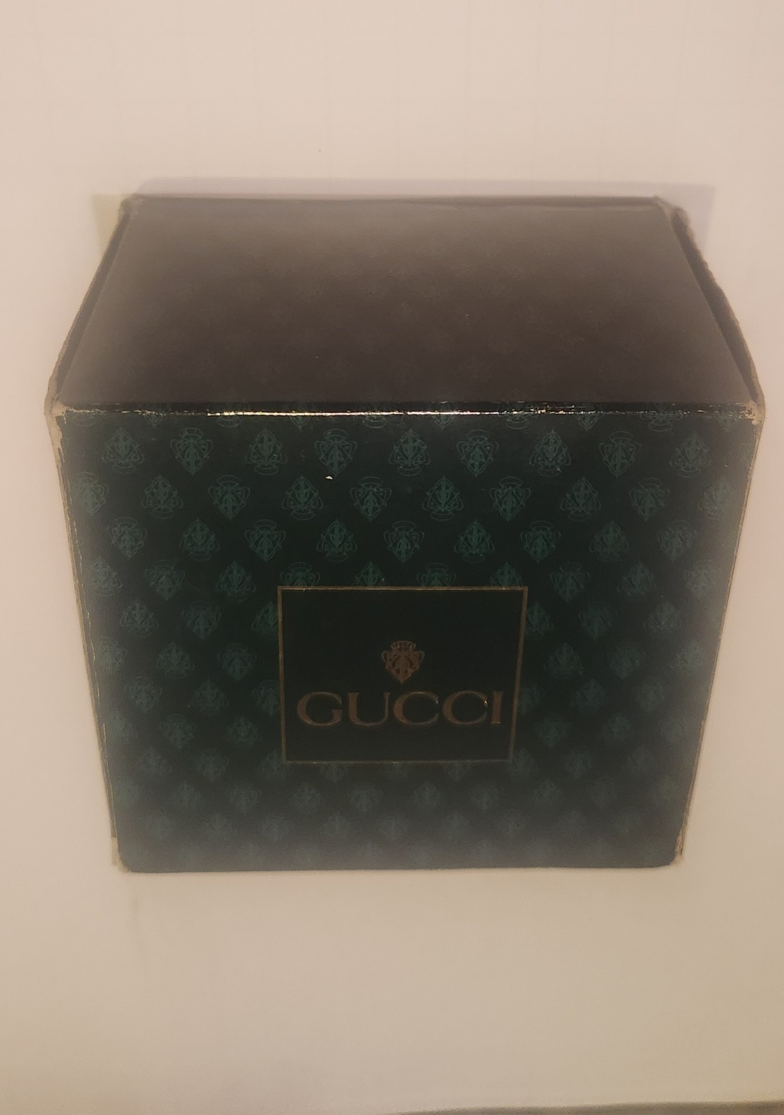 Gucci 1100 Series Interchangeable Bezel Watch (referred to as the Gucci 11/12)