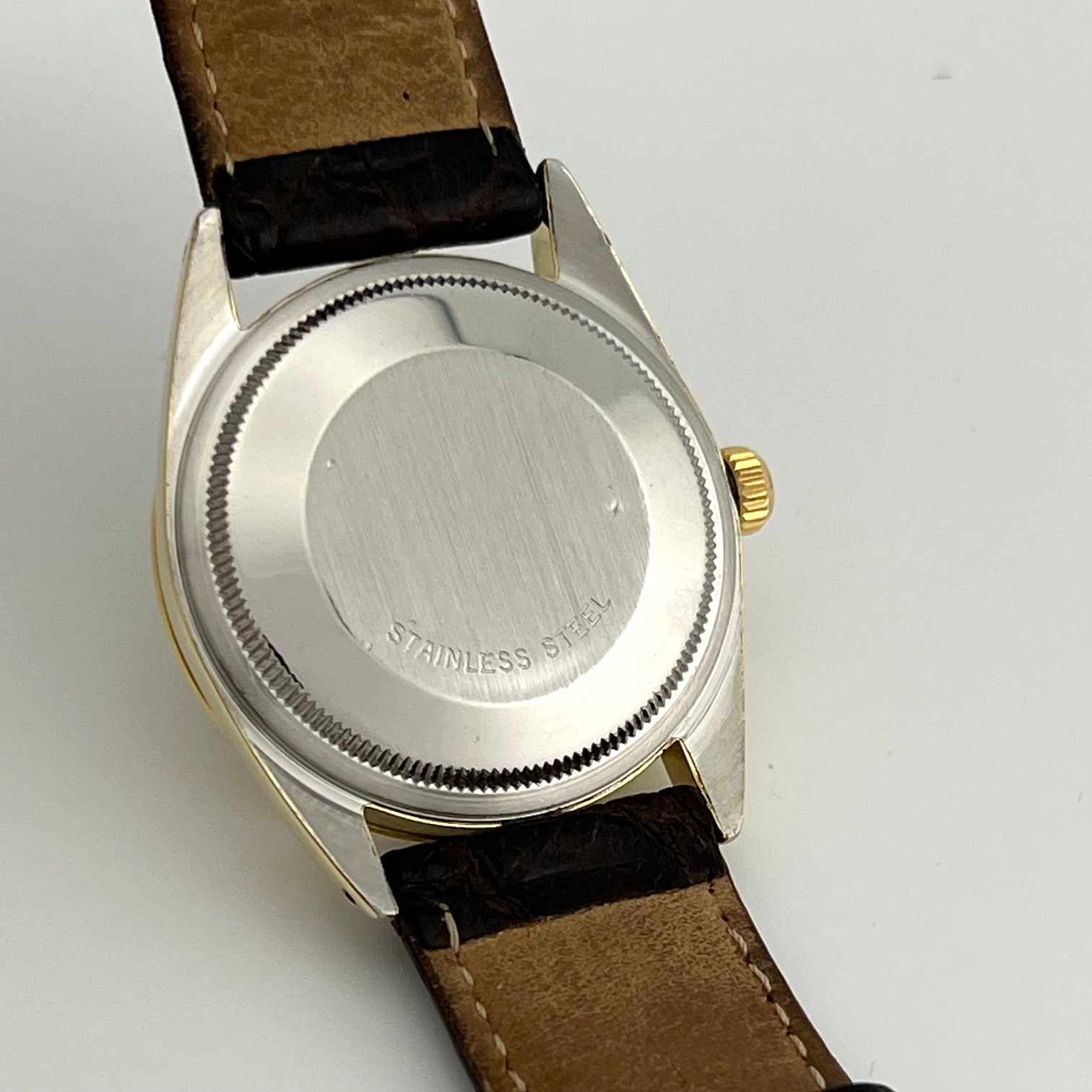 Rolex Oyster Perpetual Date 1550 34mm Champagne Dial 14k Gold Stainless Steel