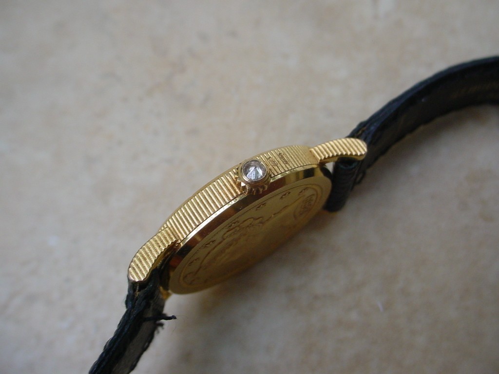 Beautiful 18K Gold Corum, $5 U.S. Gold Coin Watch.