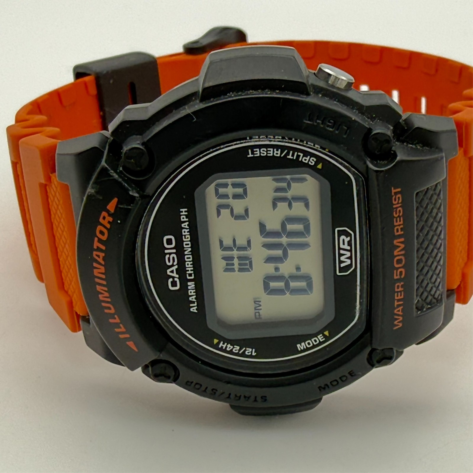 Men’s CASIO Digital Alarm Chronograph Watch, Black Case, Orange Band, W-219H-4AV