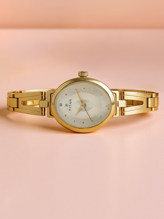 Titan Womens Gold Oval Watch Champagne Crystal Dial Stainless Steel Mesh New