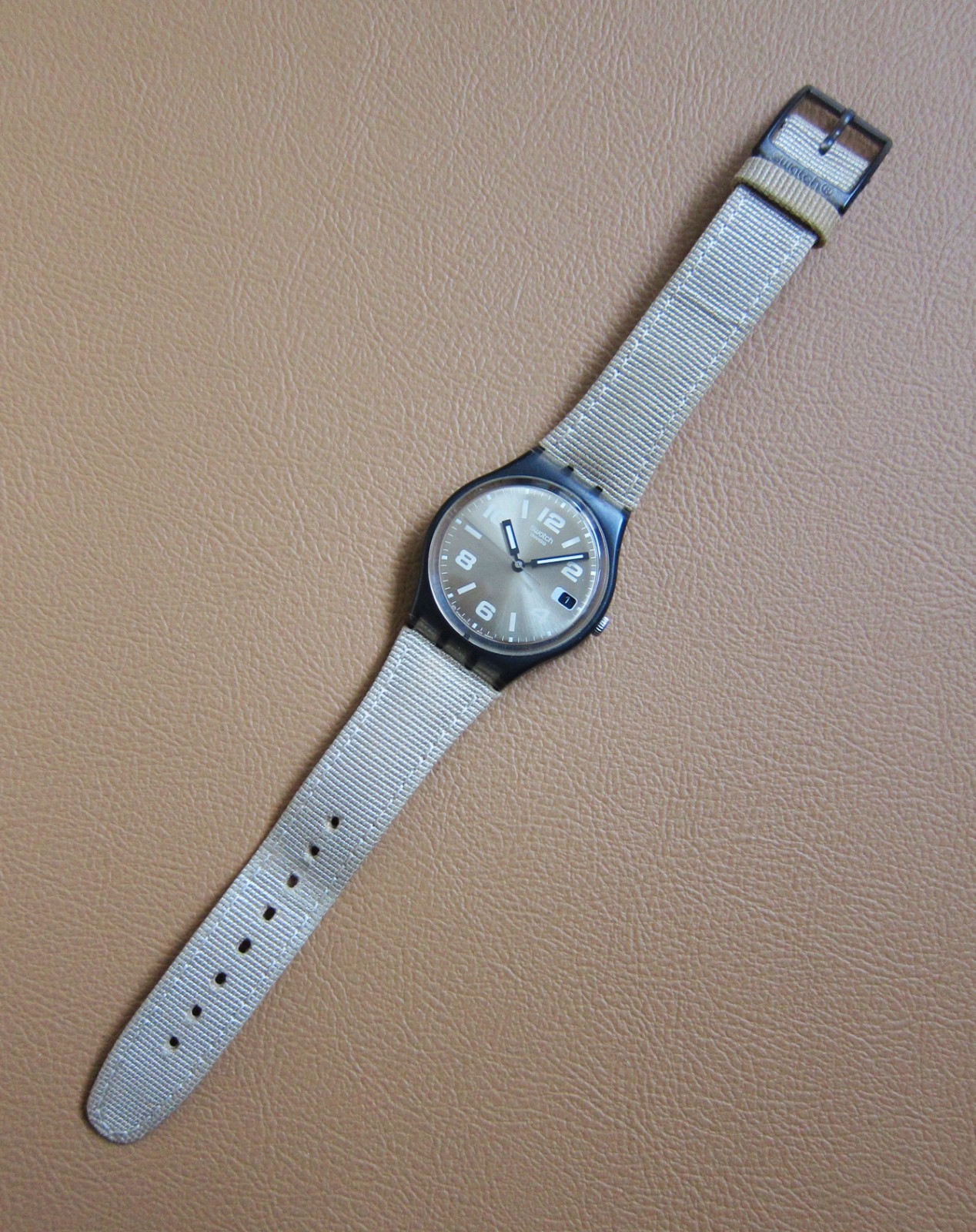 SWATCH Unisex Quartz Watch w/ Metallic Beige Dial (SWISS MADE)