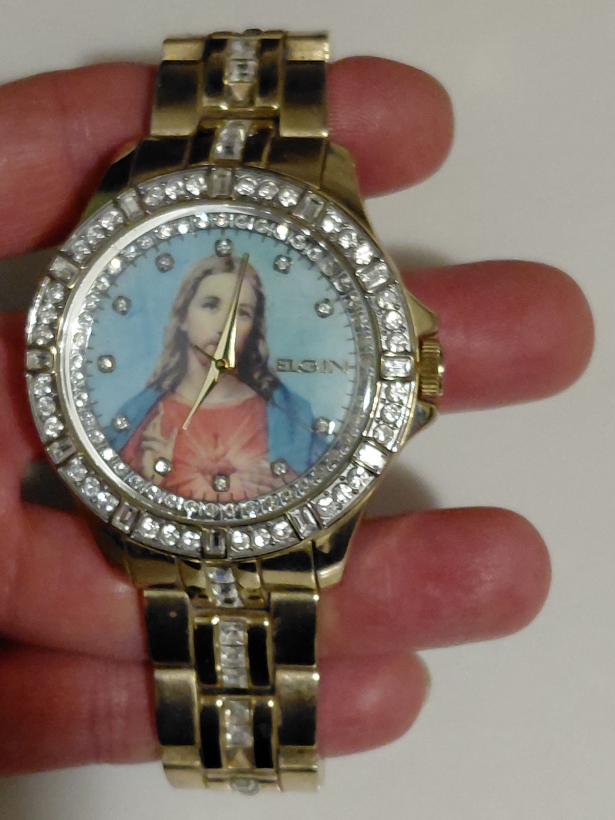 Elgin FG9116 Women’s Analog Quartz Religious Dial Gold Tone Bracelet Watch