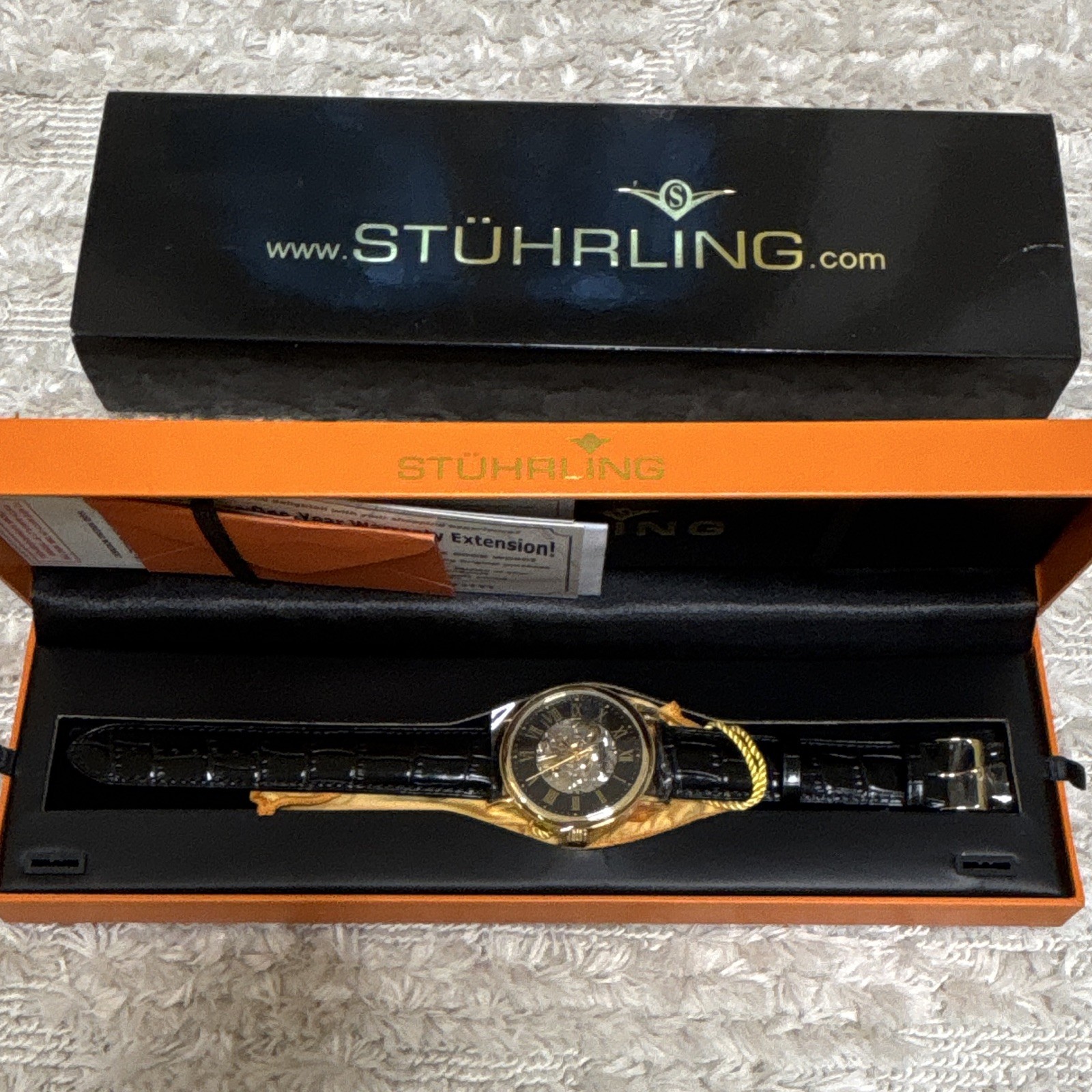 Stuhrling Original Skeleton Automatic Watch Gold Case Black Leather Strap Box